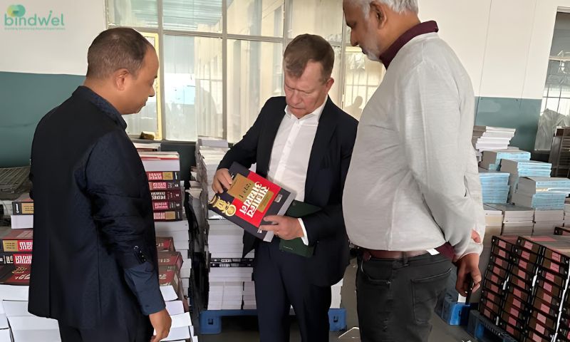 Kai Buentemeyer inspecting a book which has been produced using the Bindline at
Arihant Publications in their Meerut factory